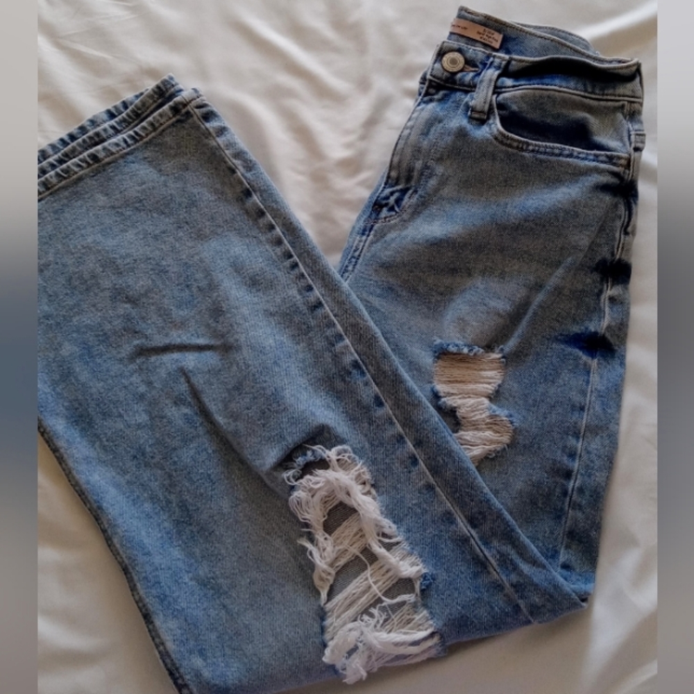 Acid washed wide leg ripped jeans